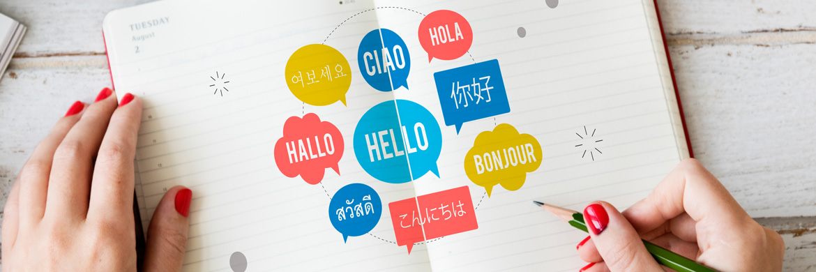 The word "Hello" written in several languages in a journal.