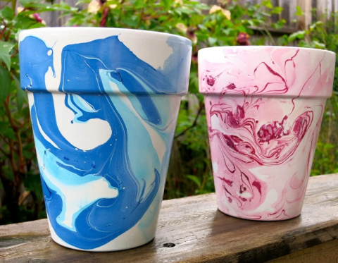 flower pots with painted designs on them courtesy of instructable