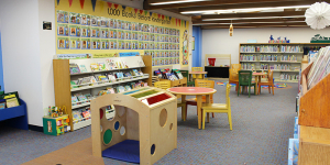 Play area in the library with games, toys, and children's books