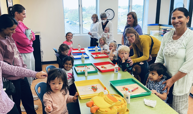 Group of parents and children during a craft event